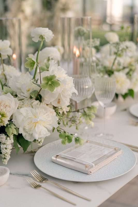 White table cloth set up of roses for special event